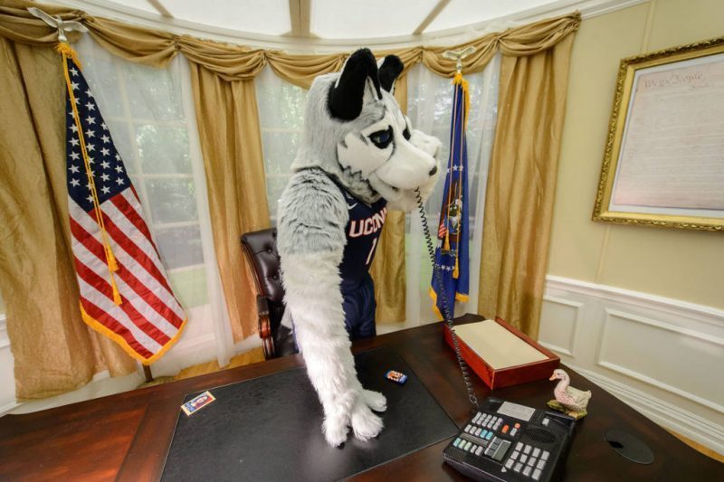 jonathon the husky making a phone call in the white house
